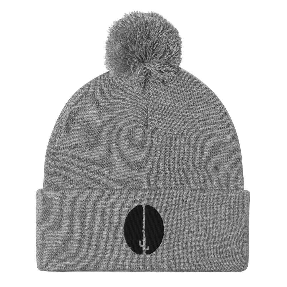 A gray beanie with a pom-pom on top and a black saguaro bean embroidery on the front.