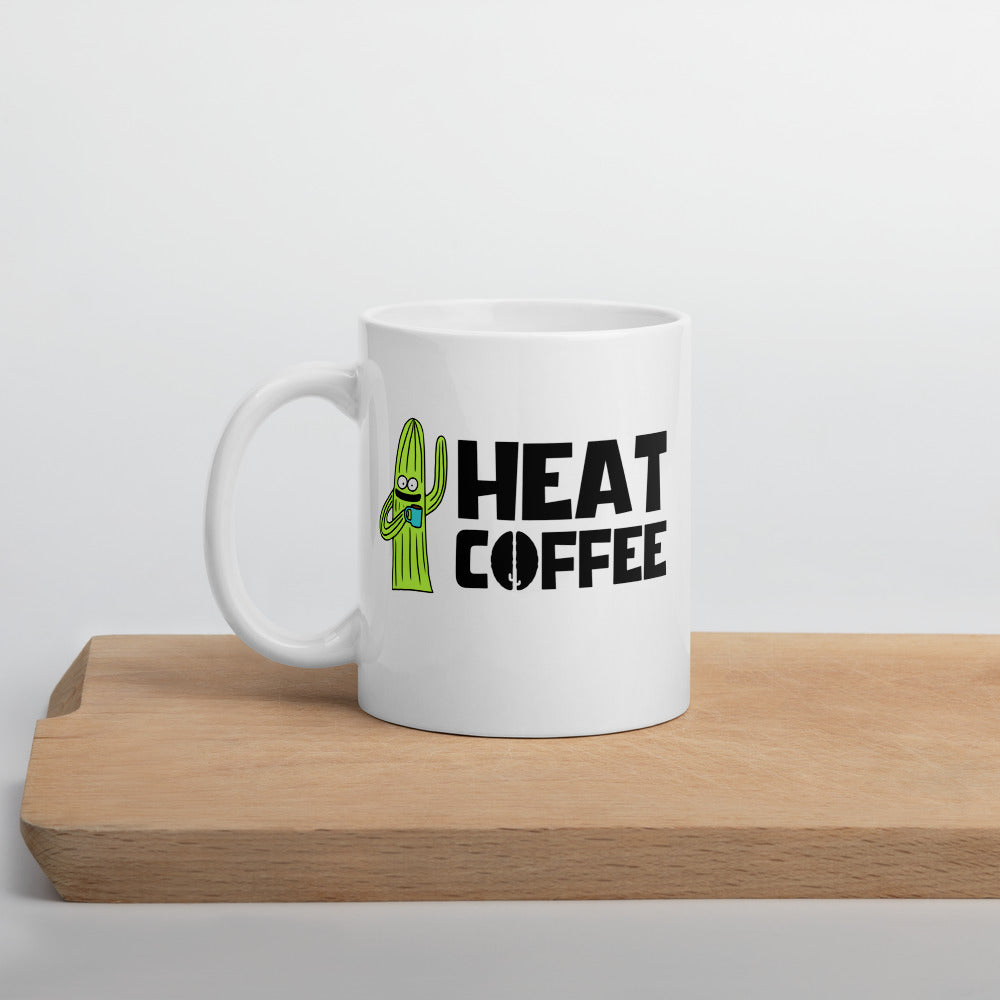 White coffee mug with Heat Coffee logo and cactus character